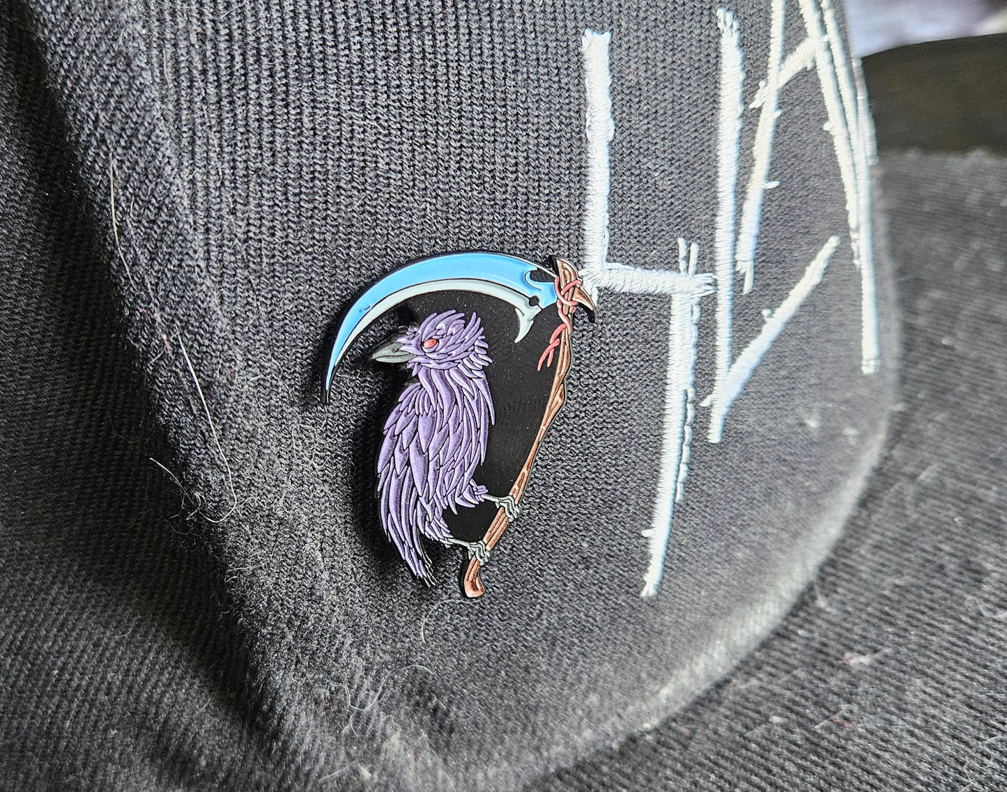 Crow Scythe 1.5 Inch Glow In The Dark Pin