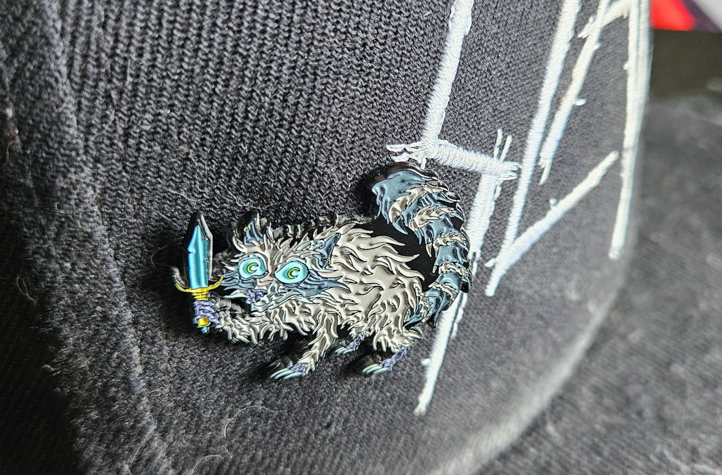 Raccoon Dagger 1.5 Inch Glow In The Dark Pin