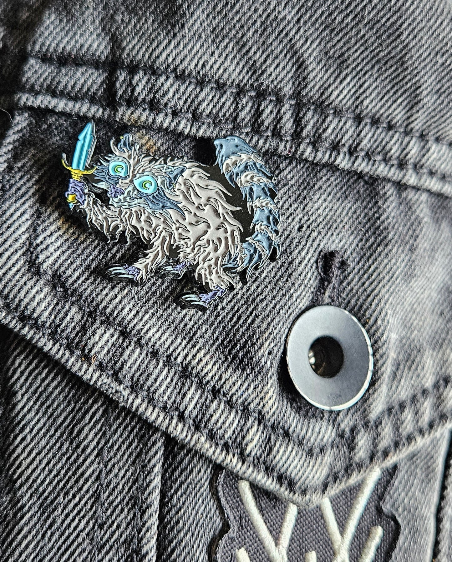 Raccoon Dagger 1.5 Inch Glow In The Dark Pin